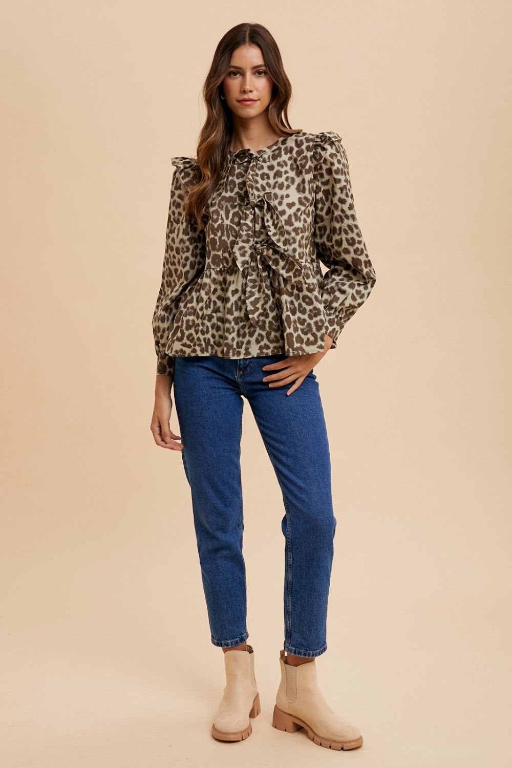 Tied Leopard Round Neck Peplum Blouse